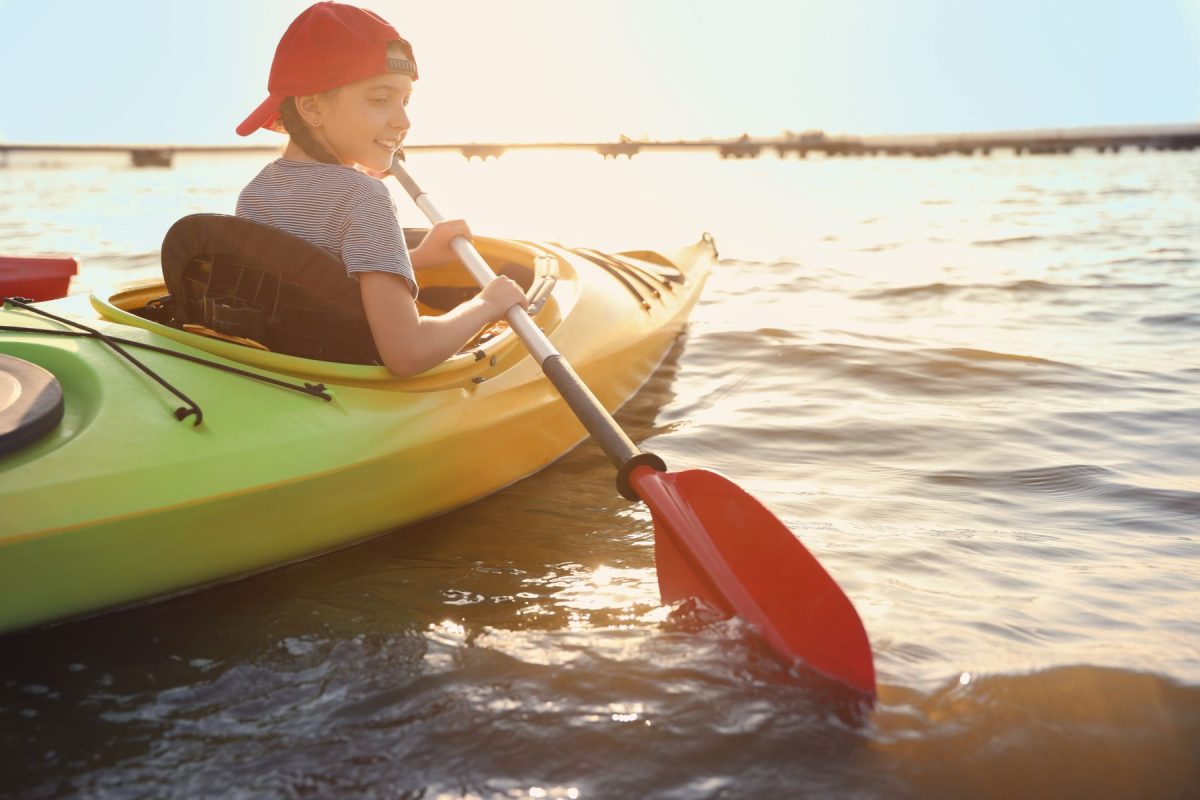 little girl kayaking in Rehoboth beach 